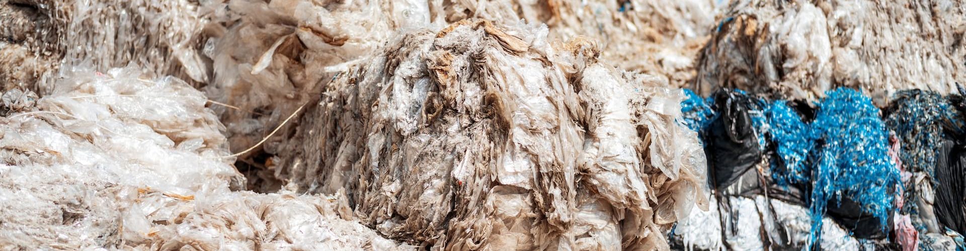 cubes-of-compressed-plastic-garbage-at-a-waste-rec-2025-02-18-14-37-13-utc (1) (1)